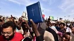 Sudanese Christians from the Nuba Mountains gather at the protest site near military headquarters in Khartoum. Sudan's Christians suffered decades of persecution under the regime of General Omar al-Bashir.
