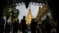 FILE PHOTO: Buddhist devotees visit  Shwedagon Pagoda during the Warso Full Moon Festival in Yangon in 2022