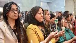Syriac Orthodox Christians attend the Easter Mass at the Saint Mary church in the northern Iraqi city of Mosul, on May 5, 2024. (Photo by Zaid AL-OBEIDI / AFP)