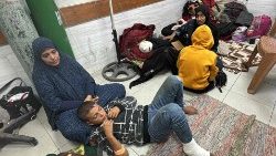 Women and children wait for medical attention as they sit on the floor of the trauma ward in the Kamal Adwan Hospital in Beit Lahia the northern Gaza Strip