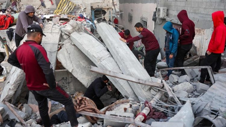 Searching for survivors in the aftermath of an Israeli strike in the central Gaza strip