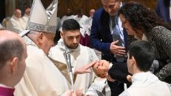 Pope Francis baptizes 21 children in the Sistine Chapel