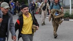 गोमा से भागते हुए लोग