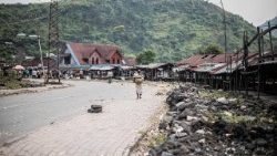 A young child walks through in the abandoned central market