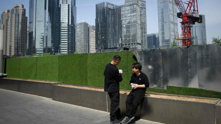 Dans le Central Business District, le quartier d'affaires de Pékin, en avril 2025. 
