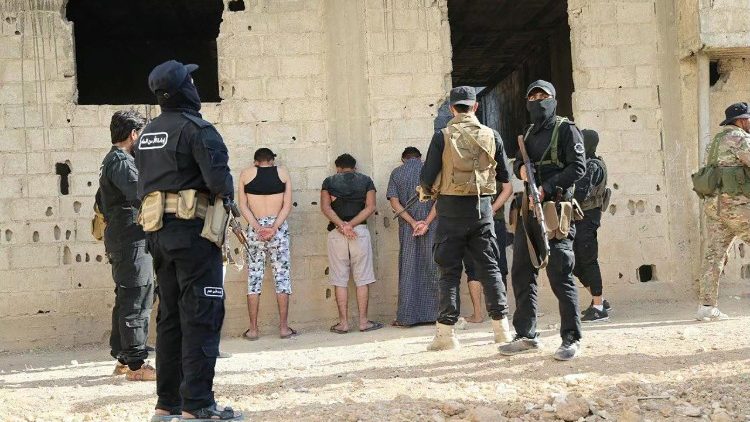 Membri delle forze di sicurezza siriane