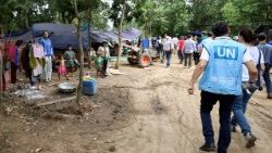 A delegation of diplomats and representatives of UN and affiliated agencies visits a refugee camp in Cambodia's border province of Oddar Meanchey