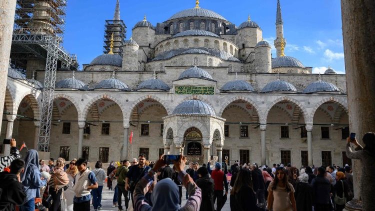 Tourists visit Sultan Ahmed Mosque, also known as the Blue Mosque, ahead of the visit of Pope Leo XIV to Türkiye