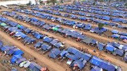 Aerial view of a temporary camp set up for displaced people in Cambodia's Oddar Meanchey province on December 11, 2025, amid clashes along the Cambodia-Thailand border