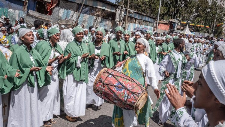 Young women sing hymns during Timkat in Addis Ababa