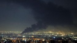 Smoke rises from the site of a U.S.-Israeli strike on Tehran
