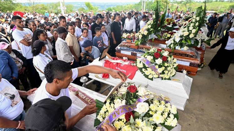 Colombians attend a mass funeral for victims of a highway bombing on April 28, 2026