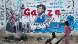 Palestinian children look at a mural depicting Israel's interception of ships participating in the Global Sumud Flotilla