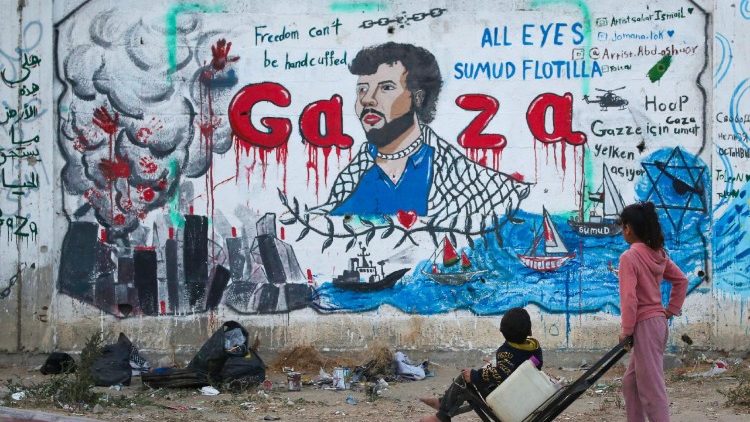 Palestinian children look at a mural depicting Israel's interception of ships participating in the Global Sumud Flotilla