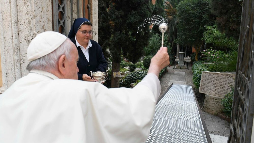Pope Francis blesses the tombs in the Teutonic cemetery
