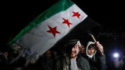 Menschen feierten nach dem Sturz von Präsident Bashar al-Assad durch oppositionelle Rebellen in Damaskus, Syrien, am 13. Dezember 2024. 