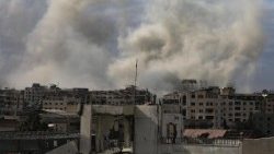 Israel continues to strike targets in Gaza City as negotiators begin indirect peace talks in Egypt