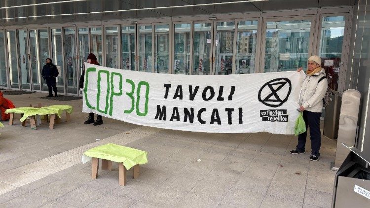 Plakat am Rand des Klimagipfels