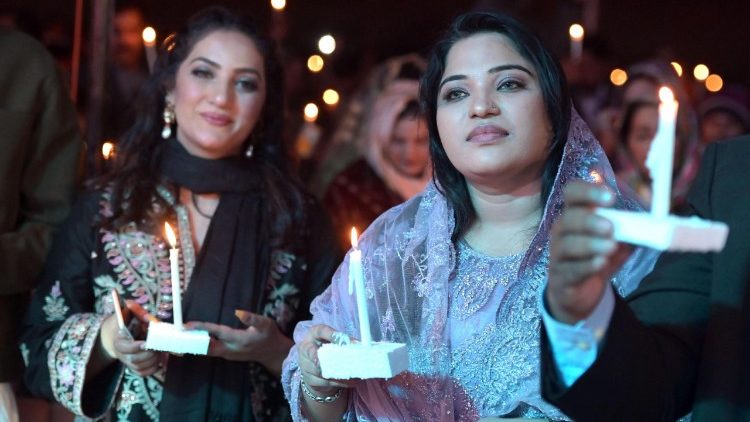 Pakistani Christians attend a grand ceremony at the FGA Ground during a Christmas celebration in Lahore, Pakistan