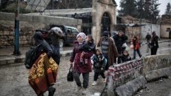 Syrian Democratic Forces (SDF) fighters withdraw from Aleppo