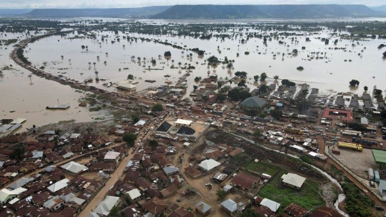 Vehicles on a flooded road in Lokoja