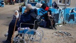 Palestinians arrive at Rafah after being evacuated from Nasser hospital