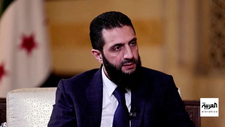 Syria's de facto leader Ahmed al-Sharaa, also known as Abu Mohammed al-Golani, speaks during an interview, in Damascus