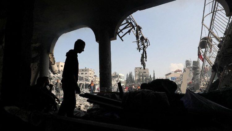 Damage at the Dar Al-Arqam school, where displaced people shelter, after it was hit by an Israeli strike