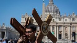 Pope Francis blesses the cross adorned with a lifejacket which would later be placed in his apartment in the Vatican