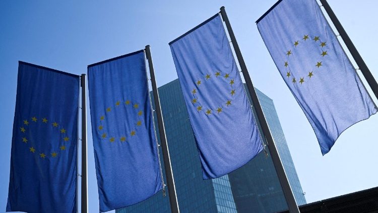 FILE PHOTO: EU flags hang outside the European Central Bank (ECB) headquarters in Frankfurt