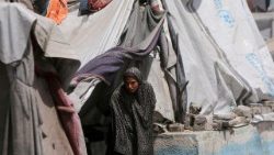 Palestinians displaced by the Israeli military offensive shelter in an UNRWA school, in Khan Younis