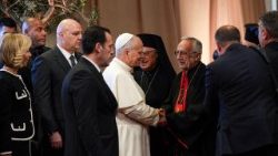Pope Leo XIV shakes hands with Patriarch Minassian