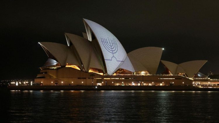A menorah is projected onto the Sydney Opera House sails after a shooting during a Jewish holiday celebration at Bondi Beach in Sydney