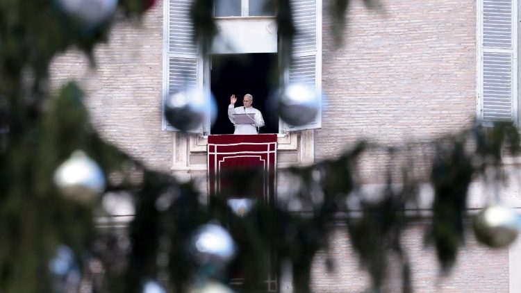 Pope Leo leads the Angelus prayer from the window of the Apostolic Palace at the Vatican