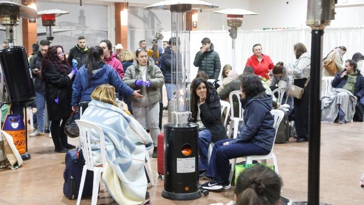 People affected by a deadly train derailment are transferred and treated at the Caseta Municipal in the town of Adamuz