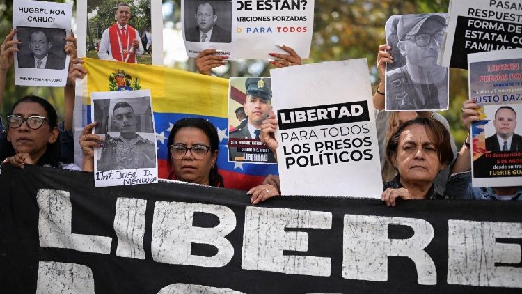 Demonstrators protest outside the Attorney General's office asking for the liberation of detained people, amid prisoner releases by the Venezuelan government, in Caracas