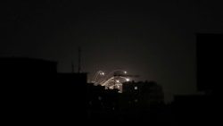 Projectiles fly through the sky