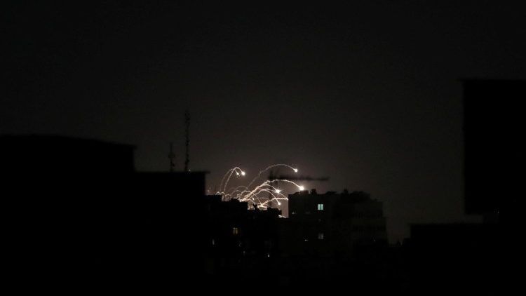 Projectiles fly through the sky