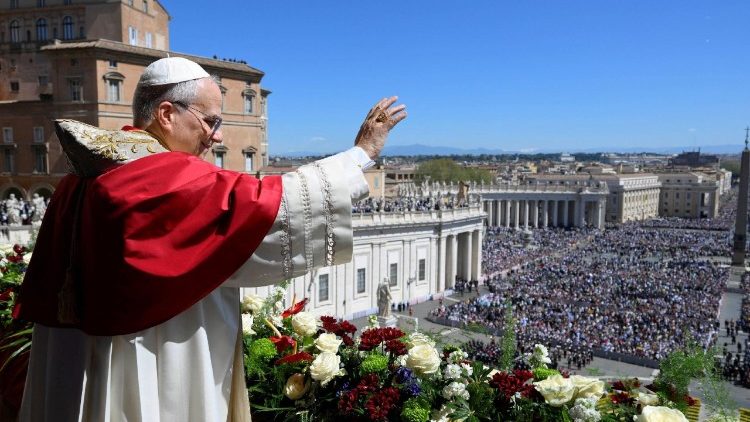 Pope Leo XIV delivers his "Urbi et Orbi" message from the main balcony of St. Peter's Basilica, on Easter Sunday, at the Vatican