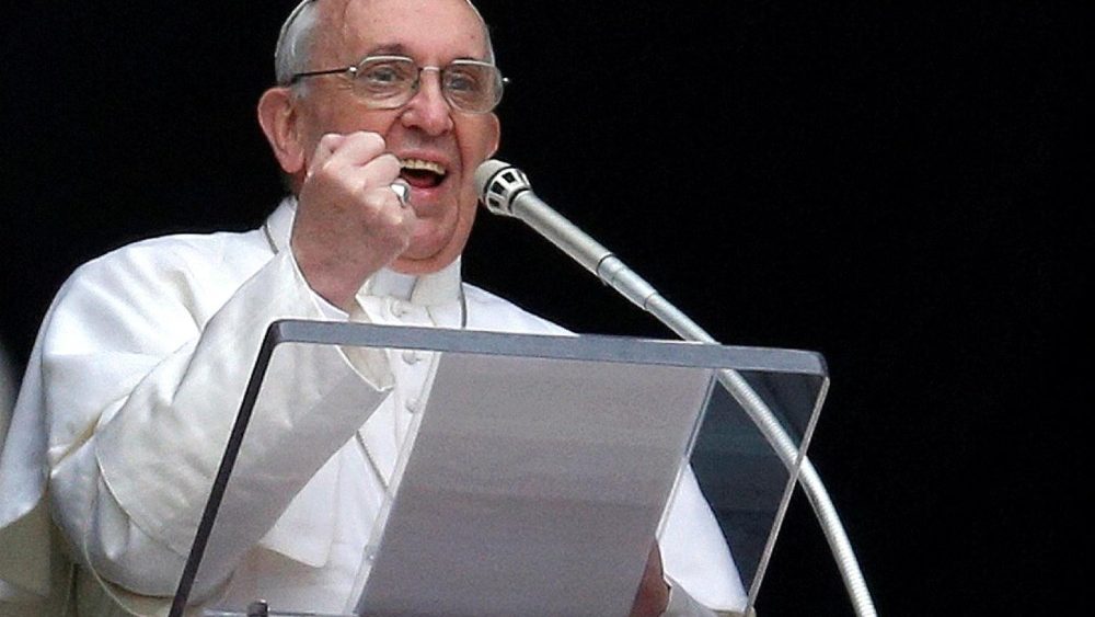 FILE PHOTO: Newly elected Pope Francis appears at the window of his future private apartment to bless faithful during Angelus prayer at Vatican