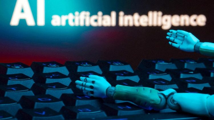 FILE PHOTO: Illustration shows message reading "AI artificial intelligence", keyboard and robot hands