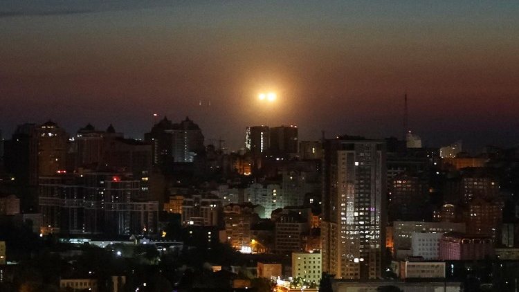 Explosions over the city as Ukrainian servicemen hit a Russian drone during a Russian drone strike, amid Russia's attack on Ukraine, in Kyiv, Ukraine May 12, 2026. REUTERS/Gleb Garanich