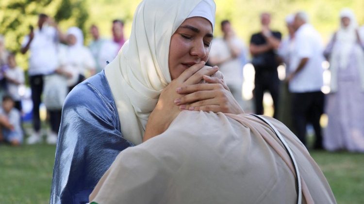 Mourners mark the 31st anniversary of the Srebrenica massacre