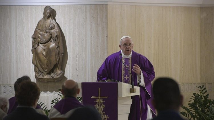 Pope Francis delivers the homily at Mass in the Casa Santa Marta