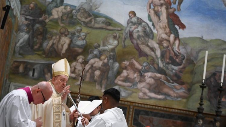 Pope Francis presides at a baptism in the Sistine Chapel
