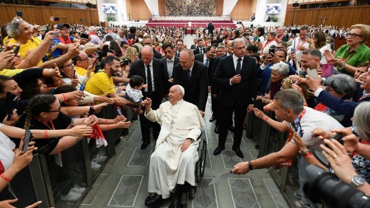 Pope Francis greets choristers in the Vatican