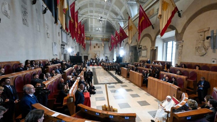 Pope Francis delivers his speech in the Hall of Flags