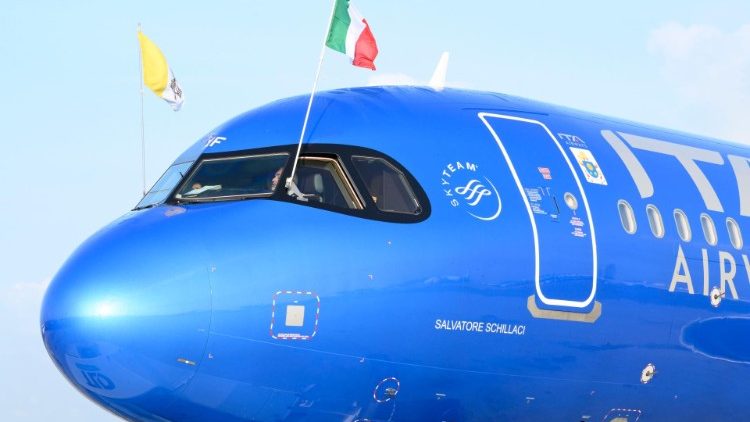 The papal plane prepares to depart