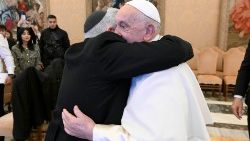 Pope Francis with a member of the Council