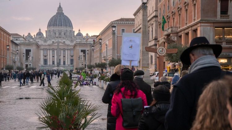 Pilgrims making the journey to the Holy Door in St. Peter's Basilica in Rome